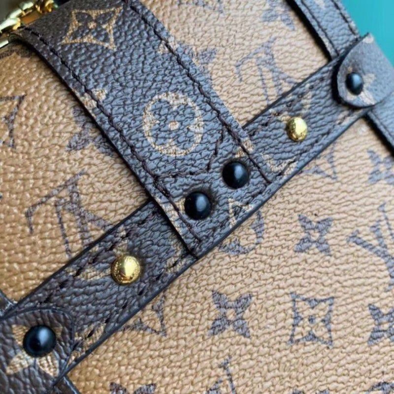 Pochette Trunk Verticale Monogram Reverse Canvas M67873